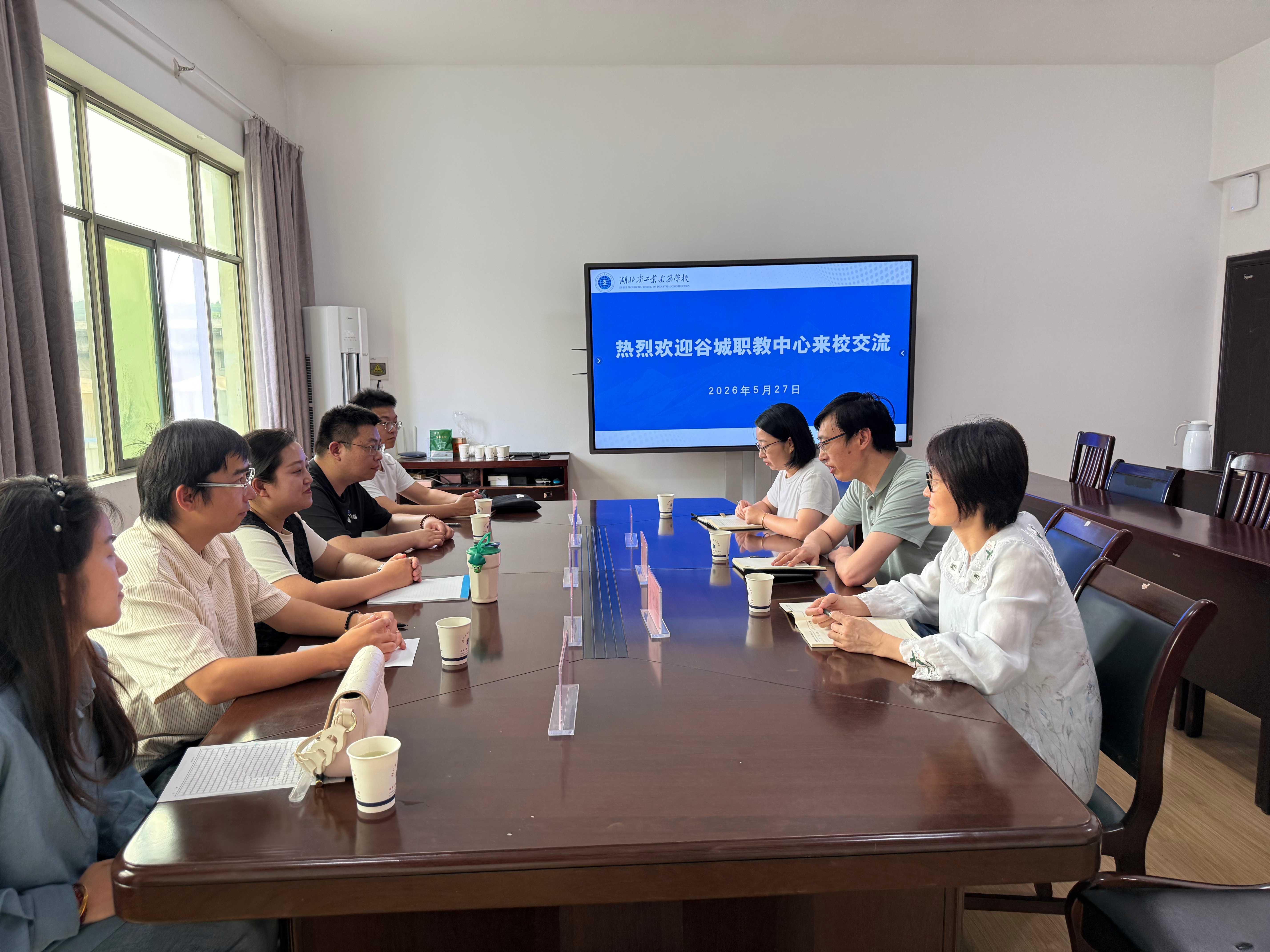 谷城职教中心来我校访问交流 共话技能大赛备赛经验(图1)